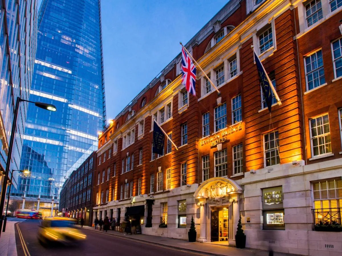 Exterior of London Bridge Hotel with flags near London Bridge Station