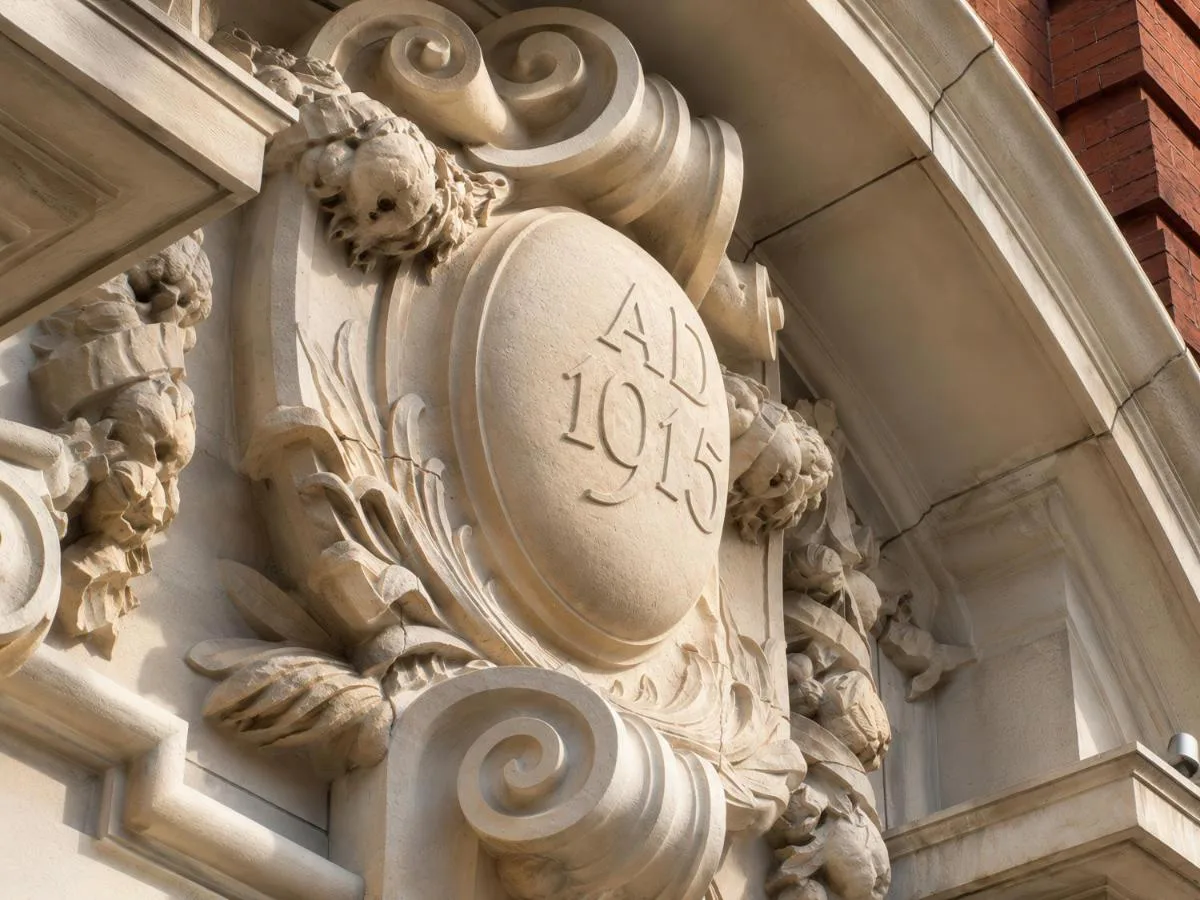 Carved stone detail on the façade of London Bridge Hotel, Southwark