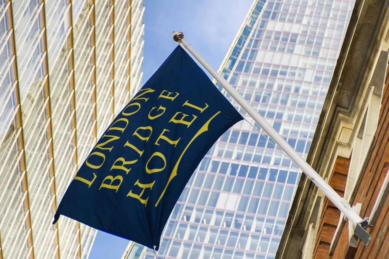 Blue flag flying above London Bridge Hotel, London